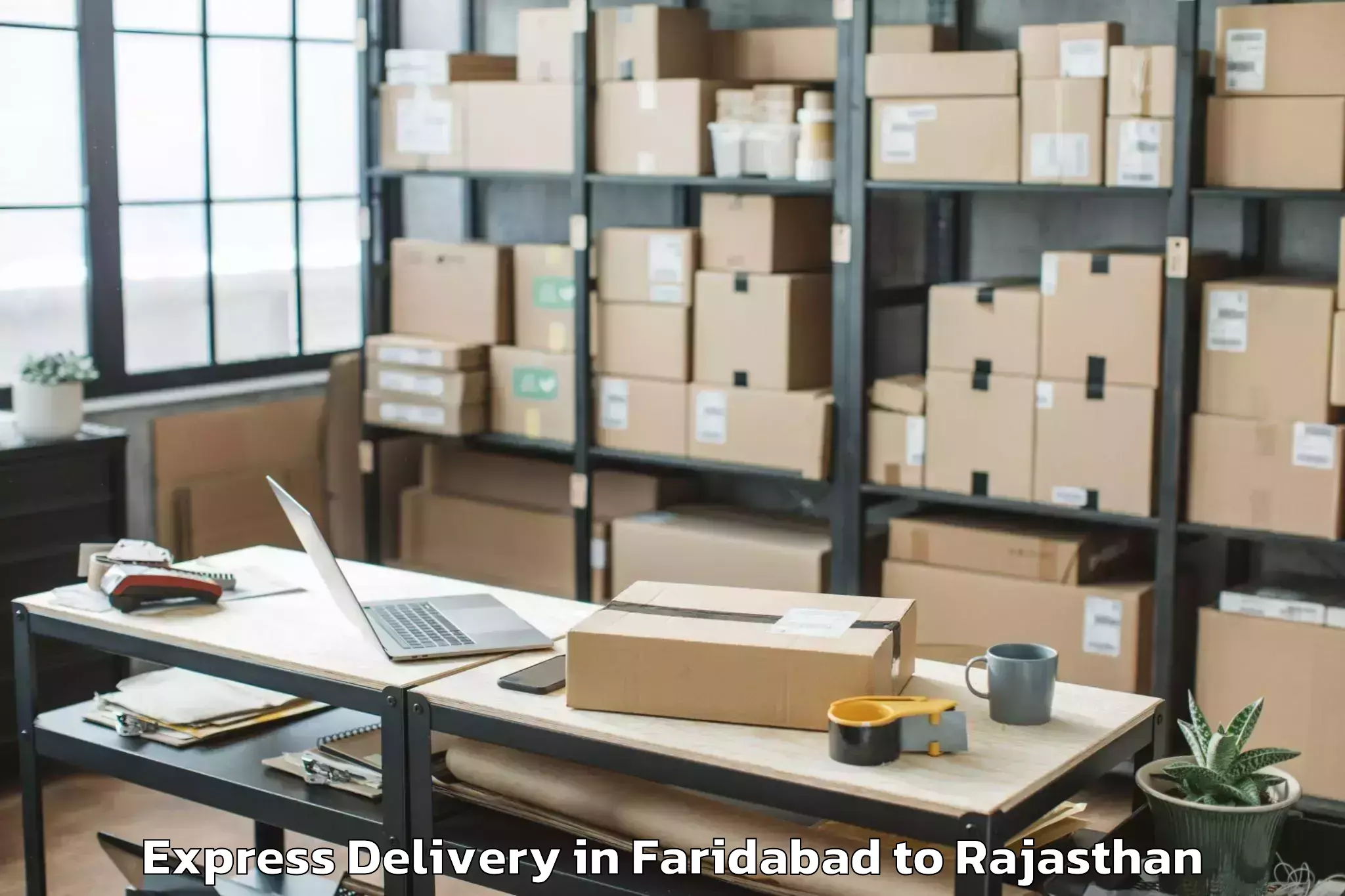 Top Faridabad to Padampur Express Delivery Available